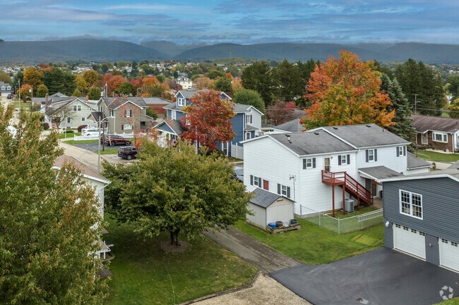 Homes sit among the pops of brilliantly colored trees in South Union.