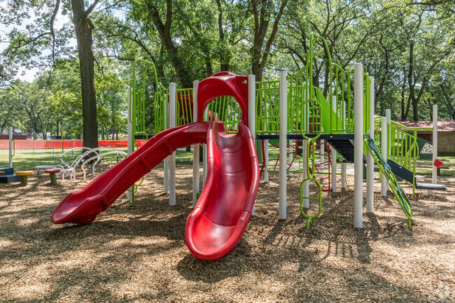 Kids can play in the shade at Sheldon Park's playground, located in Muskegon, Michigan.
