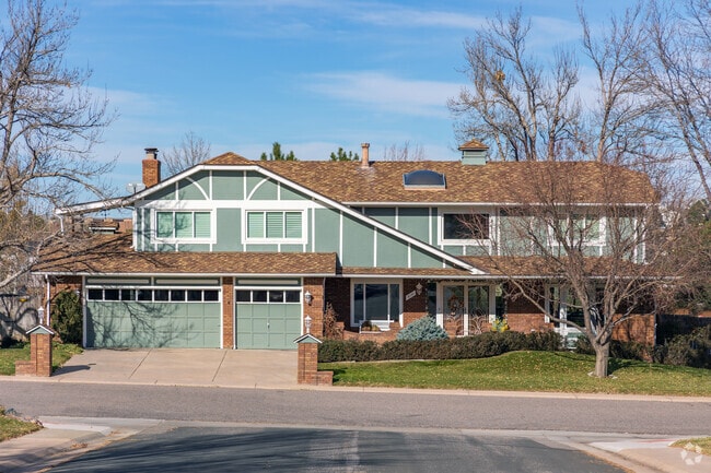 This split-level midcentury modern home in Meadowbrook Heights has a three car garage.
