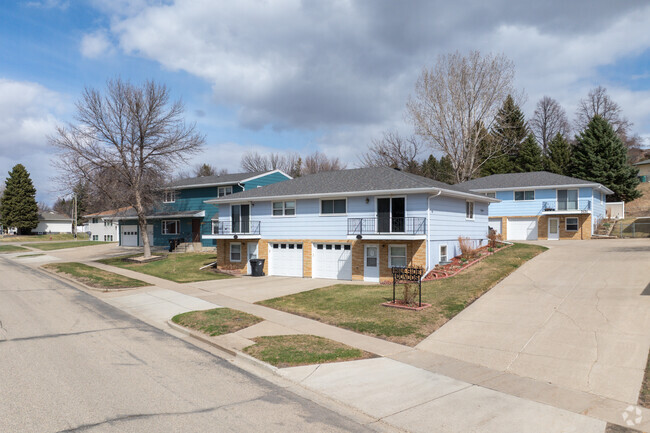 You can find multi-family condo buildings in the Hillside North neighborhood.