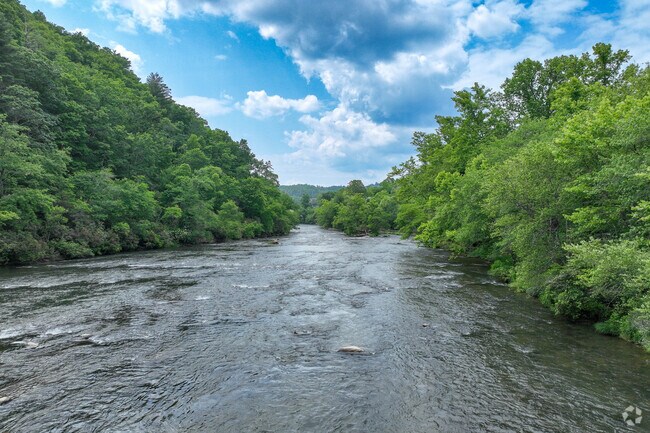 Brasstown residents have fun kayaking on the Hiwassee River.