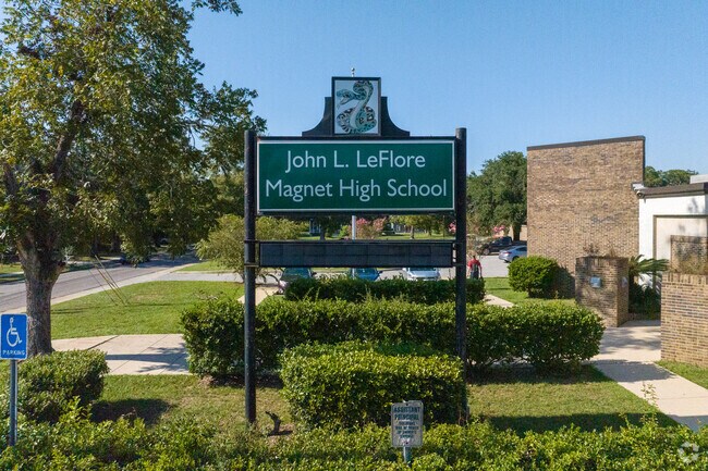 John L LeFlore Magnet High School strives for excellence near Neely.