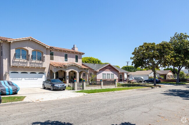 Find two-story stucco homes throughout the neighborhood streets of Longwood.