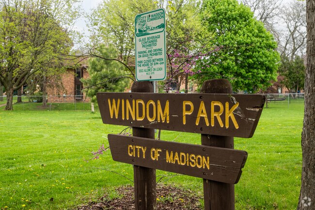 The wooden signage for Windom Park in Sherman.