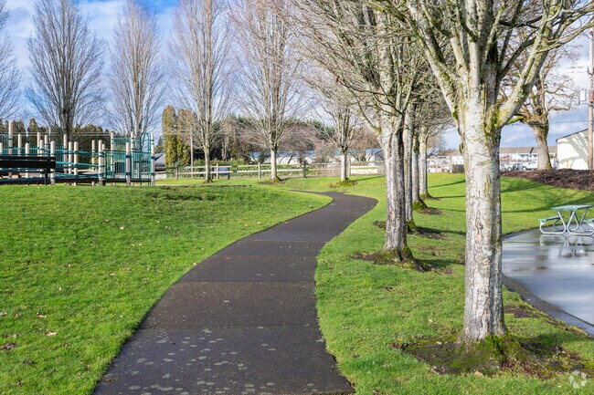 Walk the path at Harmony Road Neighborhood Park on SE Harmony Rd in Milwaukie.