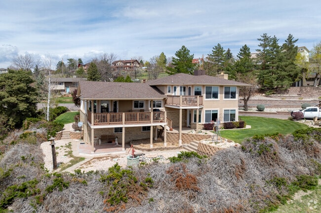 Other architectural styles at the end of these driveways include new traditional homes, bi-levels, and those with Colonial influence.