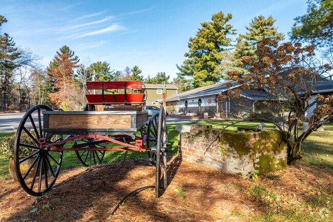 A rustic wagon decorates the entrance of The Pinewood restaurant.