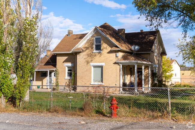 Relax on the front porch in your bungalow home in Centerfield.