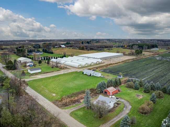Aerial view of Goodland Township with homes and farmland.