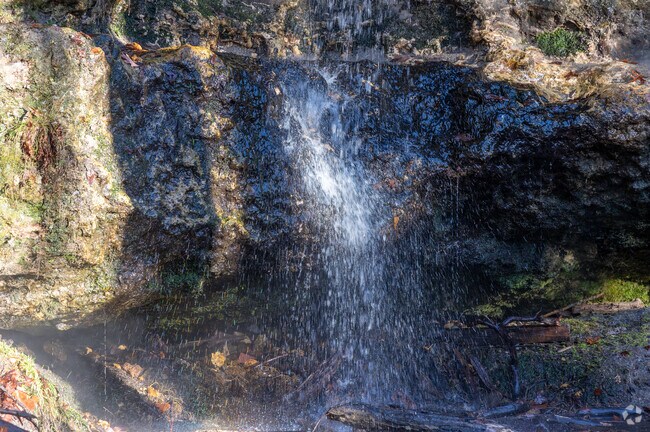 Pine Ridge residents can enjoy scenic waterfall views at Peachtree Rock Nature Preserve.