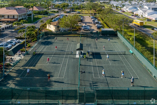Fiddlesticks residents have tennis courts available at the Cypress Lake Golf Club.