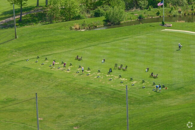 Quail Hollow residents hit the driving range before hitting the links.