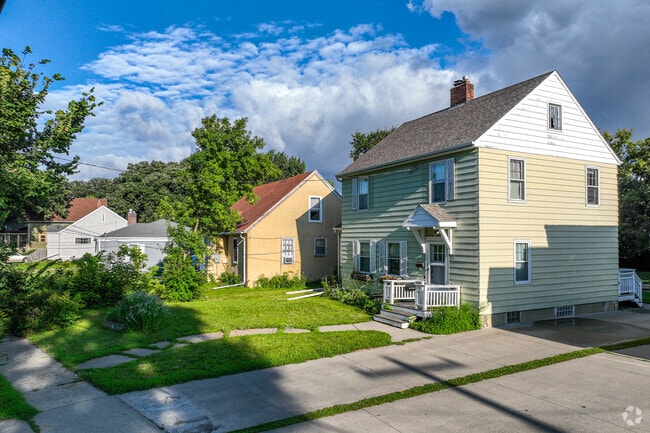 A row of beautiful one and two story homes mixed together in the Horace Mann neighborhood.