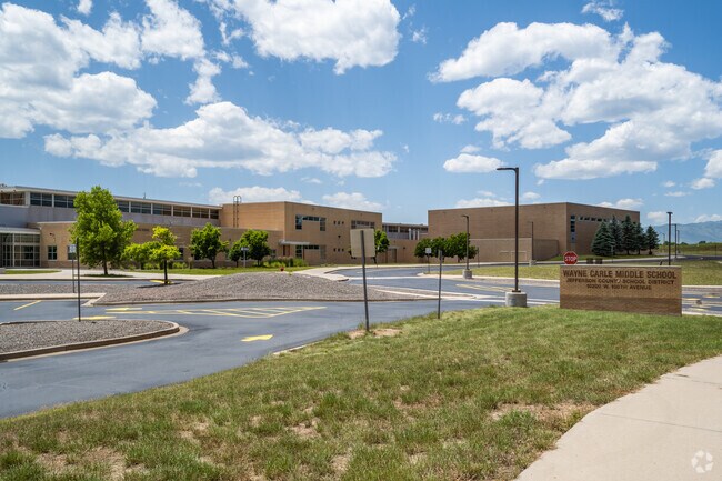 The main building and sign at Wayne Carle Middle School in Broomfield, Colorado.