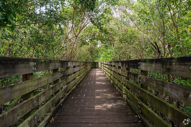 Billy Creek parks have bridges and walkways surrounded by nature.