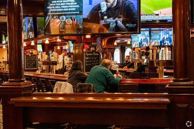 A couple enjoys lunch at The Fours in Quincy Center.