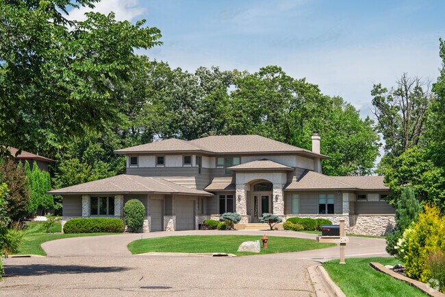Sherwood Forest showcases midcentury-inspired ranch and traditional two-story homes with brick exteriors, priced from the low $600,000s to low $800,000s on tree-covered lots.