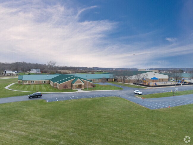 The Edgewood Intermediate School building is surrounded by acres of land.