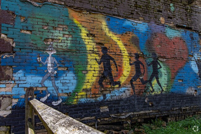 Colorful murals in Toronto, Ohio celebrate local art and community pride through public art.