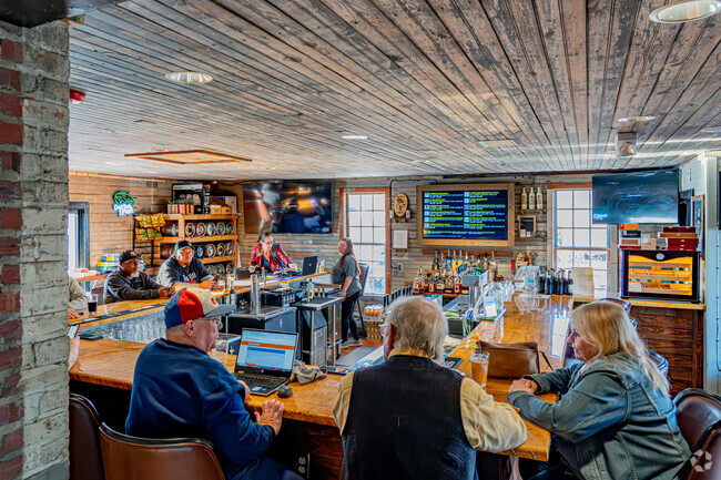 Rocky Mount residents enjoy a broad selection of craft beer and specialty wine at Goat Island Bottle Shop in Rocky Mount Mills.