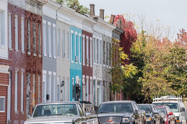 Winchester’s classic brick rowhouses display a mix of vibrant painted facades.