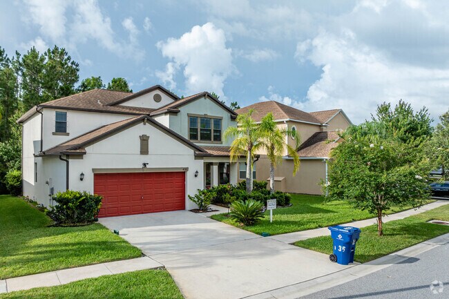 Mediterranean-inspired homes are scattered around Concord Station, FL.