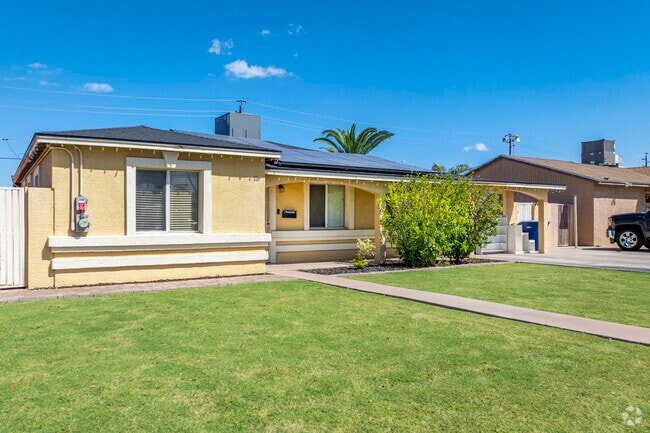 The homes in Arrowhead Meadows boast lovely grassy lawns that enhance curb appeal.