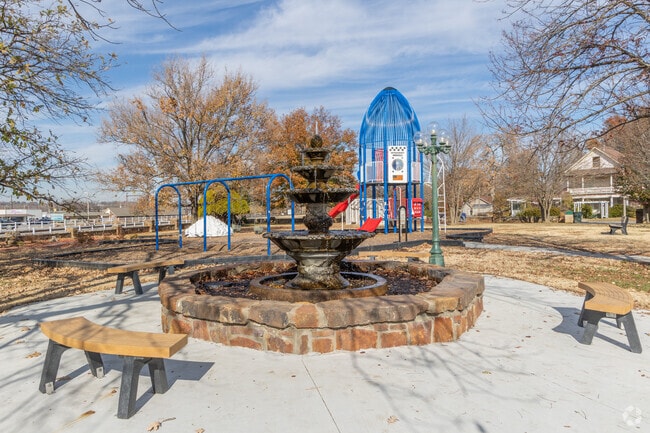 Gazebo Park features a fountain and a rocket-themed playground.