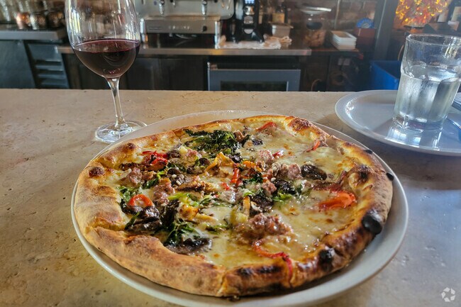 Guests enjoy wood-fired pizza at Diavola Pizzeria & Salumeria in Geyserville.