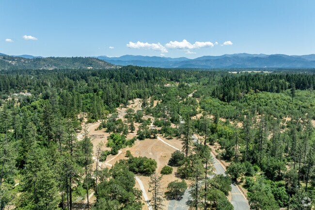 The rolling Siskiyou Mountains surround Cave Junction in Oregon.