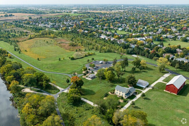 Naperville's Riverview Farmstead is a nature preserve featuring paved trails & picnic areas near South Pointe.