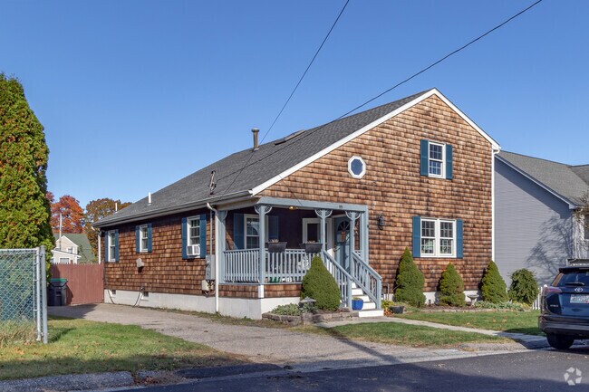 A modern take on the saltbox style home in the Rocky Point neighborhood is exemplary.