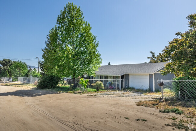 Find rows of modest Ranch-Style homes located in unpaved neighborhoods in Anza.