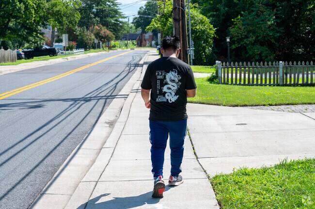 A Radiant Valley residents takes a stroll down 64th Ave in Radiant Valley.