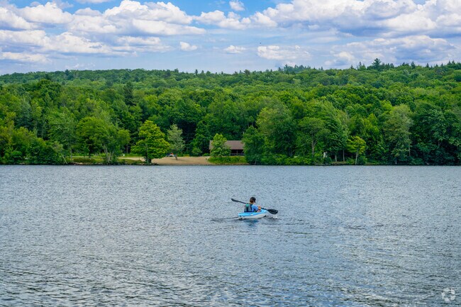 A person kayaks on Iroquois Lake near Saint George.
