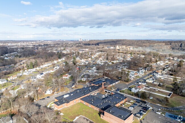 The student population of Elizabeth Green School is 307.