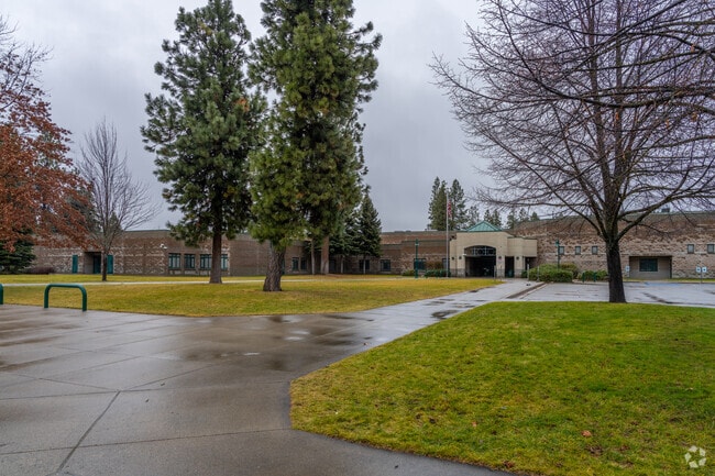 Woodlands Middle School features a large brick building.