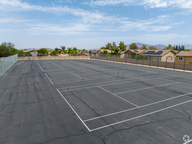 After school, the tennis team practices on the courts at Bella Vista Middle School.
