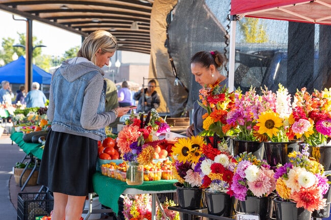 There are also several local greenhouses present with stalls filled with beautiful flowers.