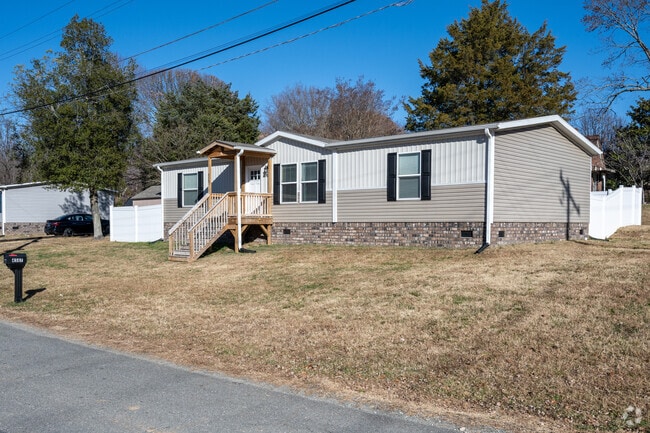 You will find homes with large yards within the Ogburn Station neighborhood.