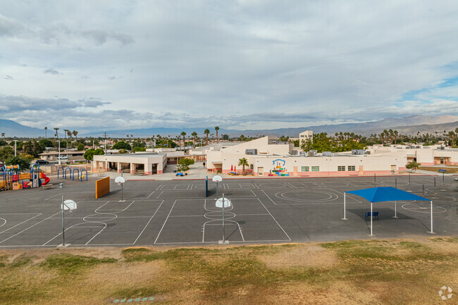 Students enjoy using the basketball court at Lyndon B. Johnson Elementary School.