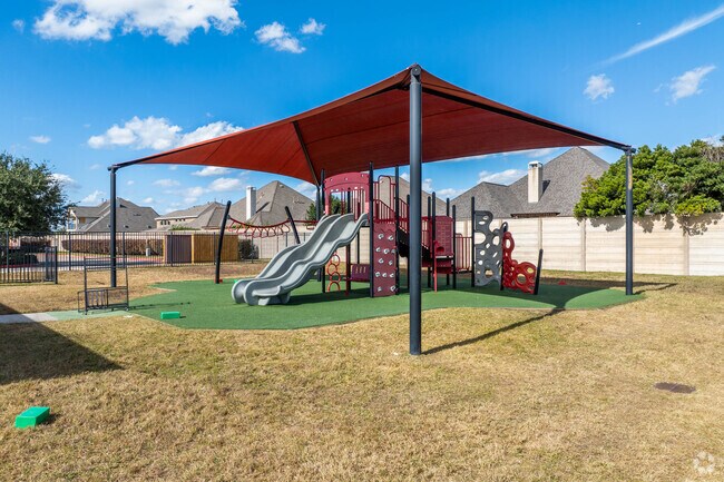 Students at Kiddie Academy of League City - East can enjoy the expansive playground equipment.