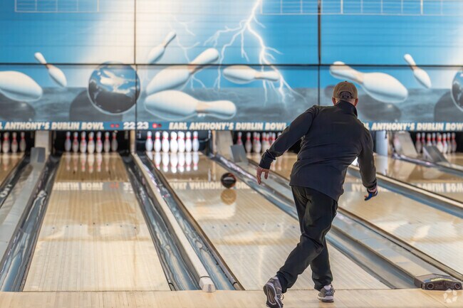 A man throws a strike at Earl Anthony's Dublin Bowl near Silverlake.