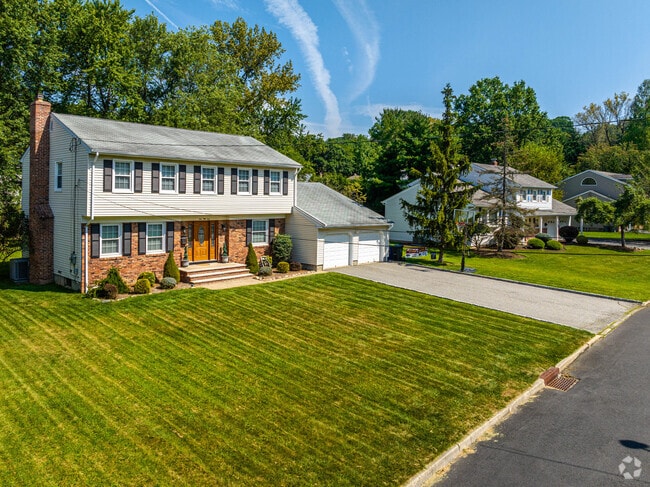 A neo-Colonial home adds to the local mix.