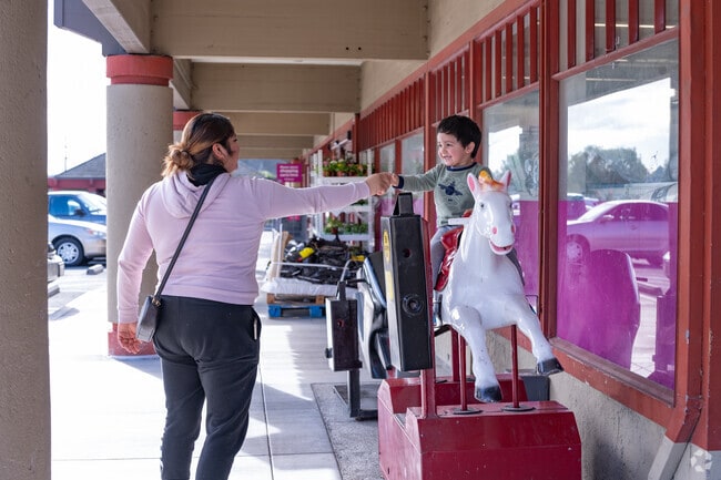 Gateley children love the pony ride outside the 99 cent only store.