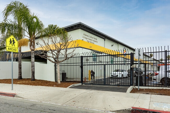 Entrance to Alliance Collins Family College-Ready High with gated entry.