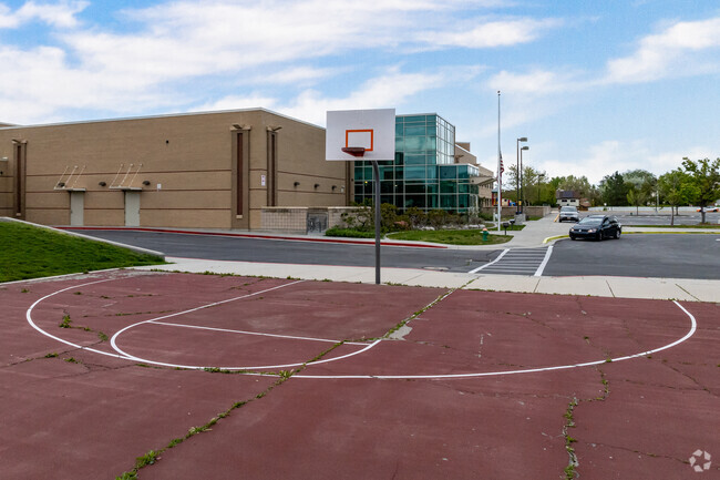 Granger Elementary School has basketball courts  near its entrance.