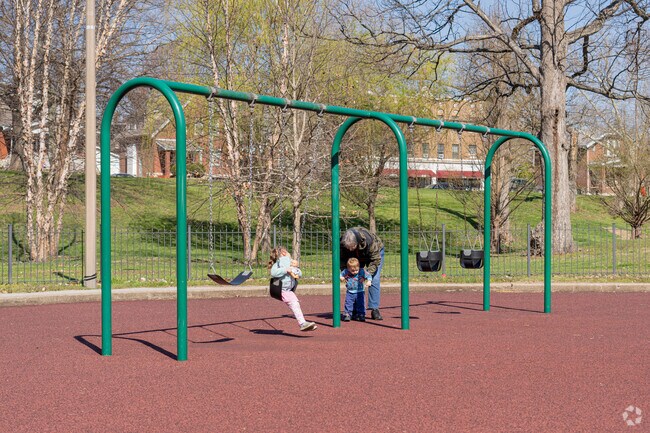 Enjoy the sunshine on the swings in Christy Park.