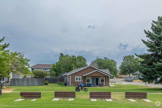 A biker rides along the paths of Lincoln Park in Helena.