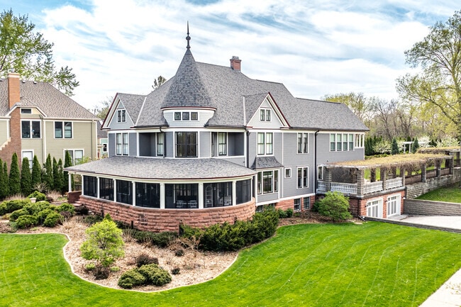 Large stately homes overlook Como Lake in the Como Park neighborhood.